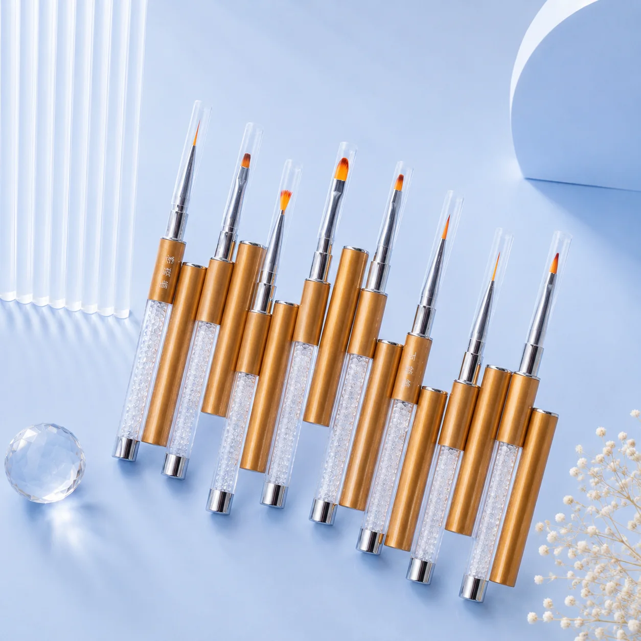 VIRAA Special 8-Piece Nail Art Brush Set standing upright with caps on, gold handles and crystal-filled clear grips