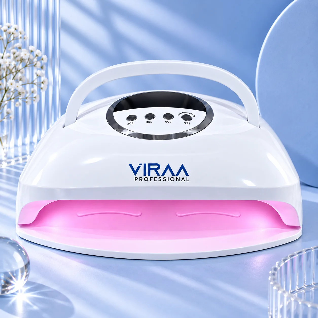 Viraa Pro Pink LED nail lamp, SUNX24 MAX, white with a carry handle and the chamber lit pink