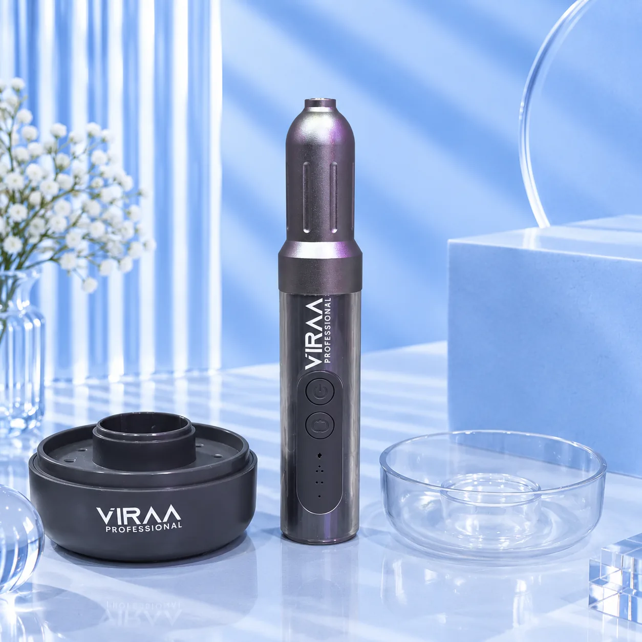 Viraa Pro rechargeable nail drill standing upright beside its stand and clear cover