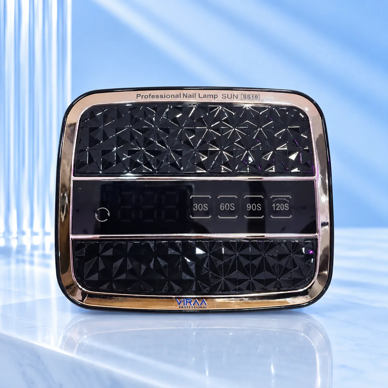 Top of the Viraa Pro SS10 rechargeable nail lamp showing the faceted panel and 30, 60, 90 and 120 second timer buttons