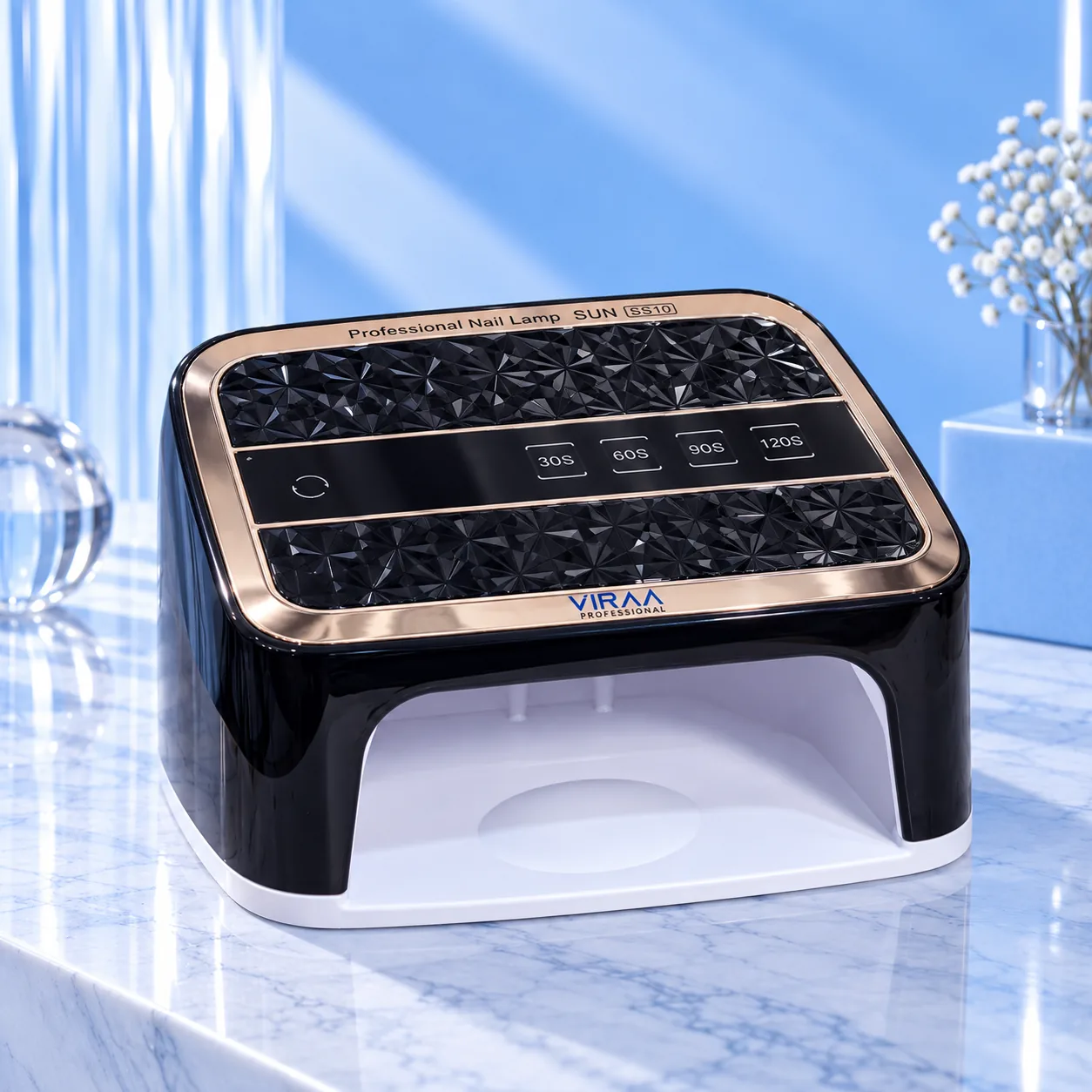 Viraa Pro SS10 rechargeable nail lamp in black with a rose gold rim, angled front view